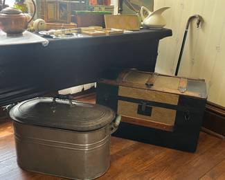 Vintage wash tub and antique steamer chest trunk
