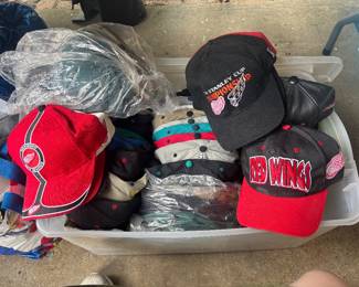 Tables of hats ranging from sports to construction to casual.
