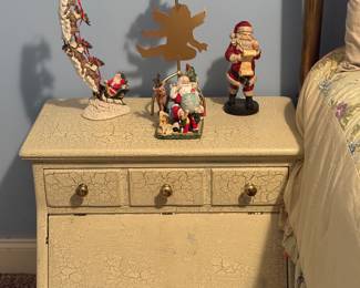 Night Stand with an Assortment of Christmas Items