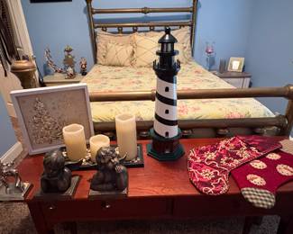 Tall Lighthouse, Two Stockings,Three Stocking Holders and a Candle Arrangement