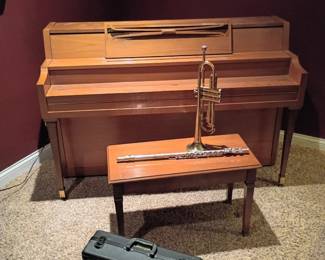 Spinet piano, trumpet, flute and saxophone