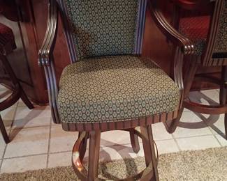 Bar stools with brass detailing