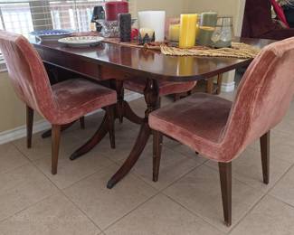 Duncan Phyfe dining table and four matching upholstered chairs
