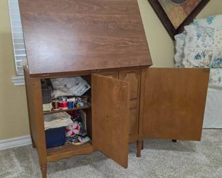 Convertible sewing table with a Sears sewing machine