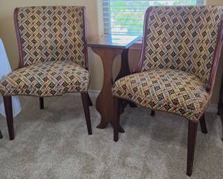 Pair of upholstered barrel back chairs