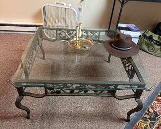 fans, hats, rugs , and sofa table