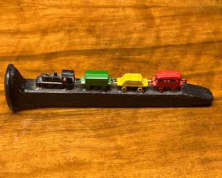 Vintage Miniature Metal Train Set on Railroad Spike