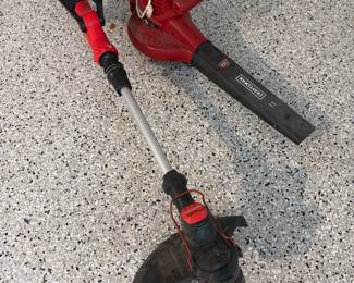 Battery operated weedeater and power blower