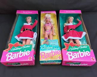 Three Barbie Dolls In Boxes