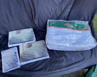 Bed Sheets And A Mattress Cover