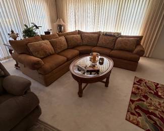 Curved sofa with pillows