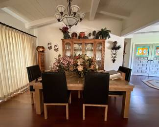 Rustic dining table with 6 leather chairs