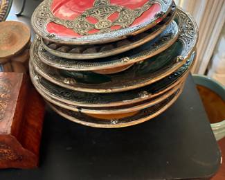 Moroccan plates, three smaller 4 larger, all different colors-red, blue, black, green, etc