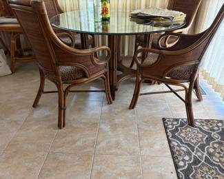 Rattan and glass table with 4 chairs