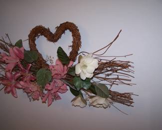 ONE OF THE MANY FAUX FLOWER ARRANGEMENTS