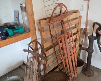 Two sleds, pitcher pump