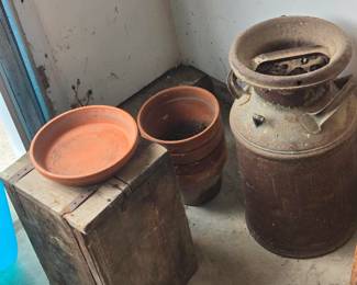 Milk can and other old boxes