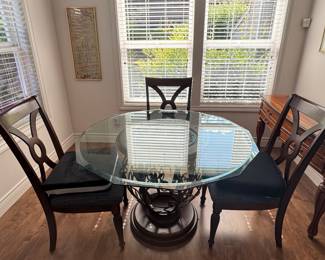 Round Glass Top Dining Table with Decorative Metal Pedestal Base