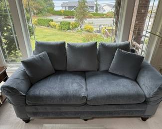 Grey Velvet Loveseat with Patterned Throw Pillows