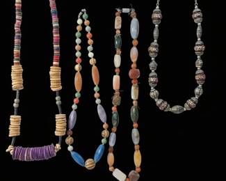 Collection of Four Fashion Beaded Necklaces including Wood, Stone, and Glass Beads