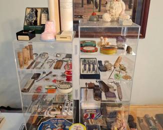Wide Variety of Goodies in the Showcases Including: 2 Waterford Pen Sets, Military Medals, Ice Pick, Metal Banks, and Much More!