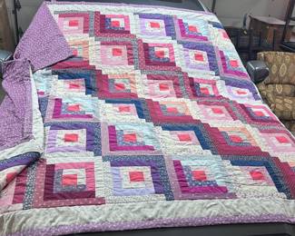 A wonderful 8’ x ~ 6 1/2’  hand stitched quilt.