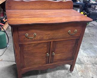 Oak wash stand with a backsplash or a Gallery rail.