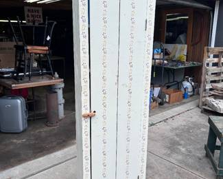 hand painted 6 shelf wood cabinet.