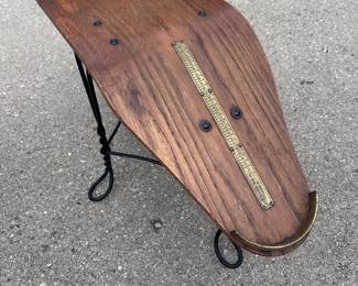 a shoe store fitting stool w/ the brass scale andthetwisted iron wire legs! VERY COOL!!!