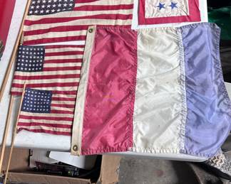 3 - 48 star flags & a WWI/WWII (used by the family via a front home window) service banner, and the red/white&blue ‘signal style banner’ with grommets.