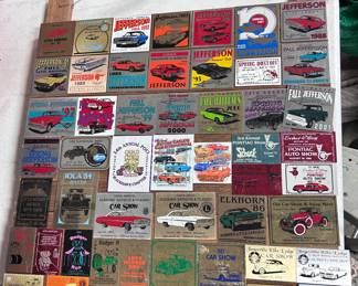 50 plus 1980s/90s/early 2000s car dash plaques representing Jefferson, Elkhorn, Iola WI car shows.