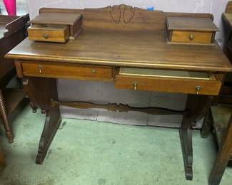 Writing desk with stepped top with two drawers and two small drawers on top