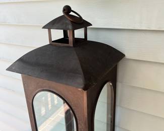 F72 - $15. Decorative Lantern. Measures 10" square x 30.5" tall.