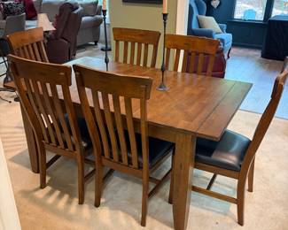 F1 - $450. Dining Table + 6 Chairs with 2 Butterfly Leaves. Table is 63.5" x 38" x 29" tall. Each leaf adds an additional 18". Table + Chairs are in excellent condition. Chairs are 19" wide x 20" deep x 40.5" tall. Floor to Seat is 19.5".