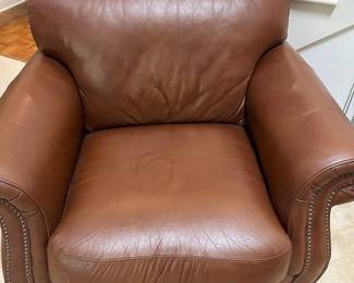 F4 - $795. Robinson & Robinson Leather Chair & Ottoman with antiqued nailhead trim. Both pieces are in excellent condition. Very comfortable!Chair measures 44" x 36" x 36.5" tall. Floor to seat is 19". Ottoman measures 29" wide x 25.5" deep x 17" tall.