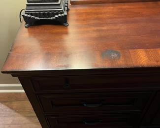 F35 - $275. Aspen Home Dresser with Mirror. Measures 66" wide, 20" deep, 80.5" with mirror. All drawers slide and it's in very good condition.