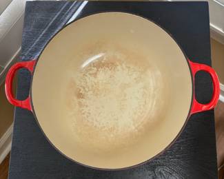 F41 - $60. Le Creuset #22. Inside shows some gentle wear but overall very good condition.
