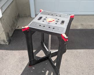 F102 - $25. Plastic Folding Miter Saw Table. 23.2 in. W x 31.5 in. H
