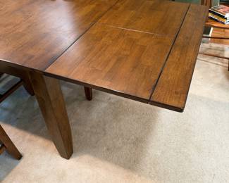 F1 - $450. Dining Table + 6 Chairs with 2 Butterfly Leaves. Table is 63.5" x 38" x 29" tall. Each leaf adds an additional 18". Table + Chairs are in excellent condition. Chairs are 19" wide x 20" deep x 40.5" tall. Floor to Seat is 19.5".
