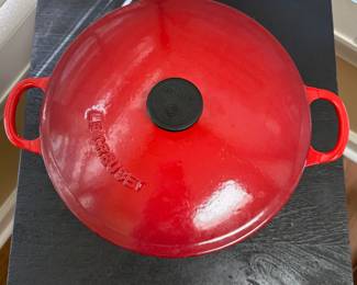 F41 - $60. Le Creuset #22. Inside shows some gentle wear but overall very good condition.