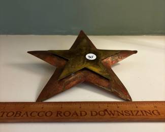 F94 - $30. Copper Star - maybe a tree topper? Has big loop on the back.