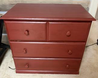 F27 - $65. Small Red Dresser. Measures 28.5" wide, 17" deep, 26" tall