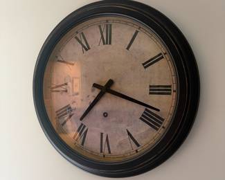 F48 - $10. Clock. Measures 18" round