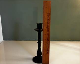 F65 - $20. Single Cast Iron Candle Holder.