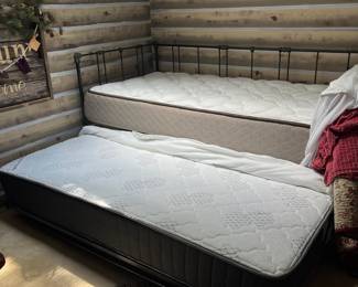 F56 - $175. Twin day bed with trundle. Measures 79" wide, 39" deep, 38" tall. Includes 2, clean, twin mattresses if you'd like them.