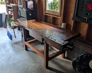 F99 - $1,750. Antique Carpenter's Bench. Has been used in the house as a decoration, serving station, and was moved out to sell the home. CLEAN! and in beautiful antique condition!