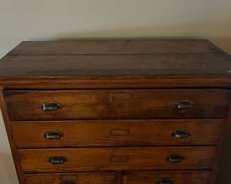 F25 - $895. 15 Drawer Flat File - solid wood. Measures 41" tall, 20" deep, 60" tall. All drawers slide. In very good condition!