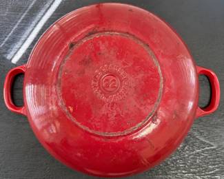 F41 - $60. Le Creuset #22. Inside shows some gentle wear but overall very good condition.