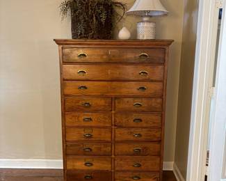 F25 - $895. 15 Drawer Flat File - solid wood. Measures 41" tall, 20" deep, 60" tall. All drawers slide. In very good condition!