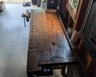 F99 - $1,750. Antique Carpenter's Bench. Has been used in the house as a decoration, serving station, and was moved out to sell the home. CLEAN! and in beautiful antique condition!